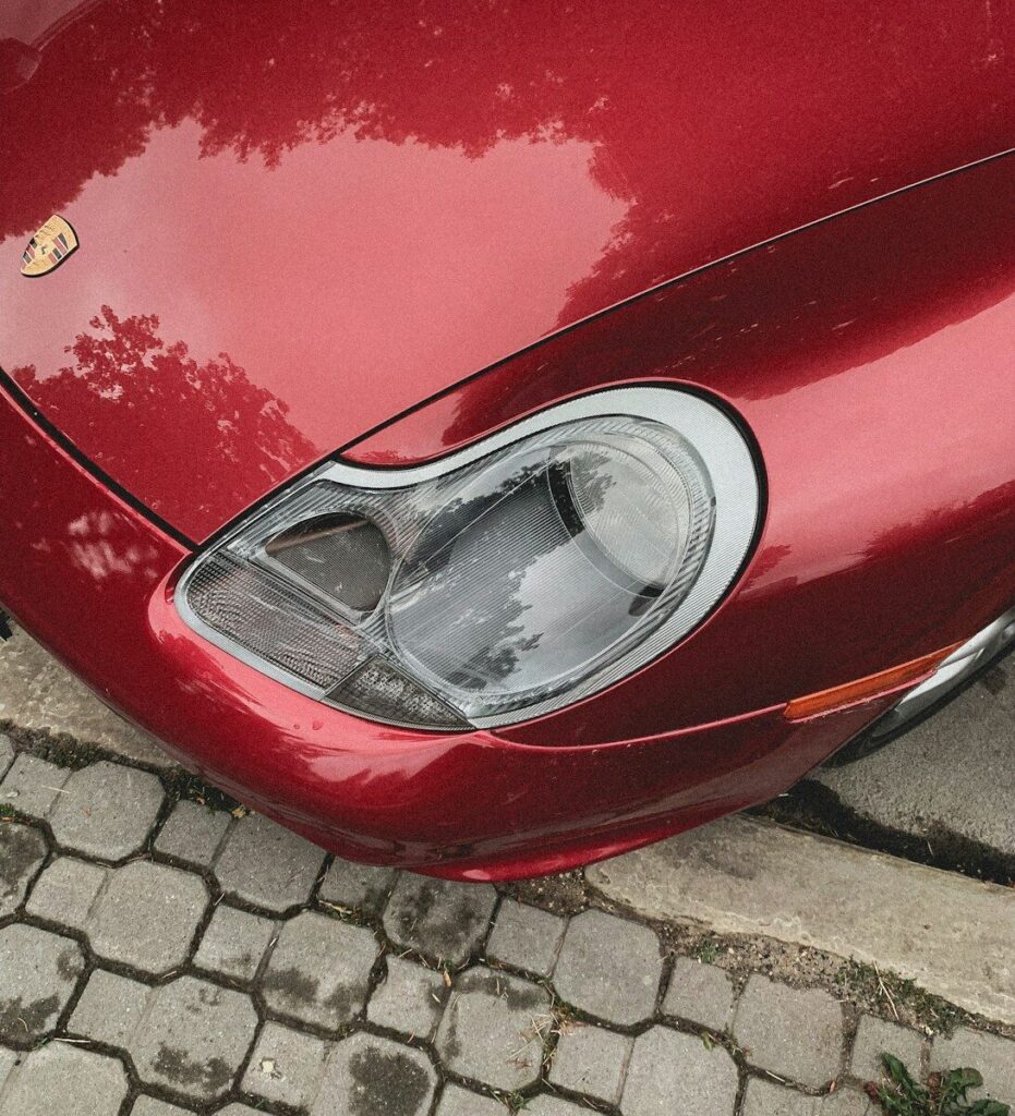 red car on gray brick floor