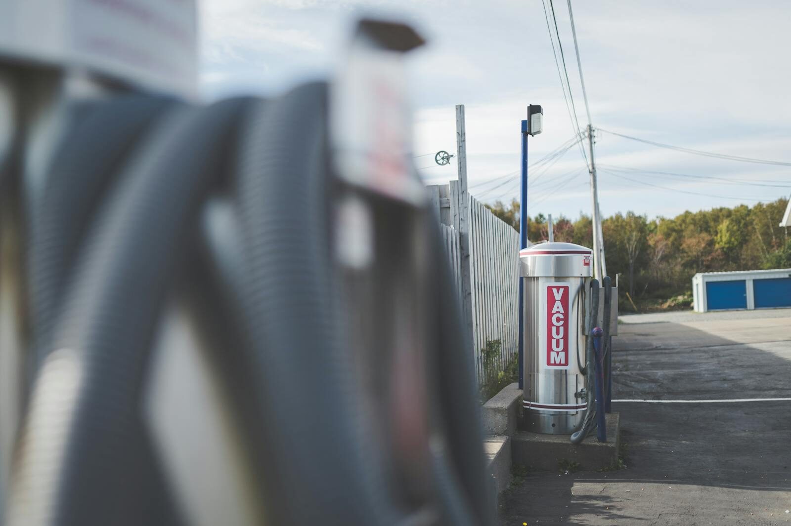 Photo by Stephen Andrews Vacuum station at an outdoor car wash on a clear day with no people around.