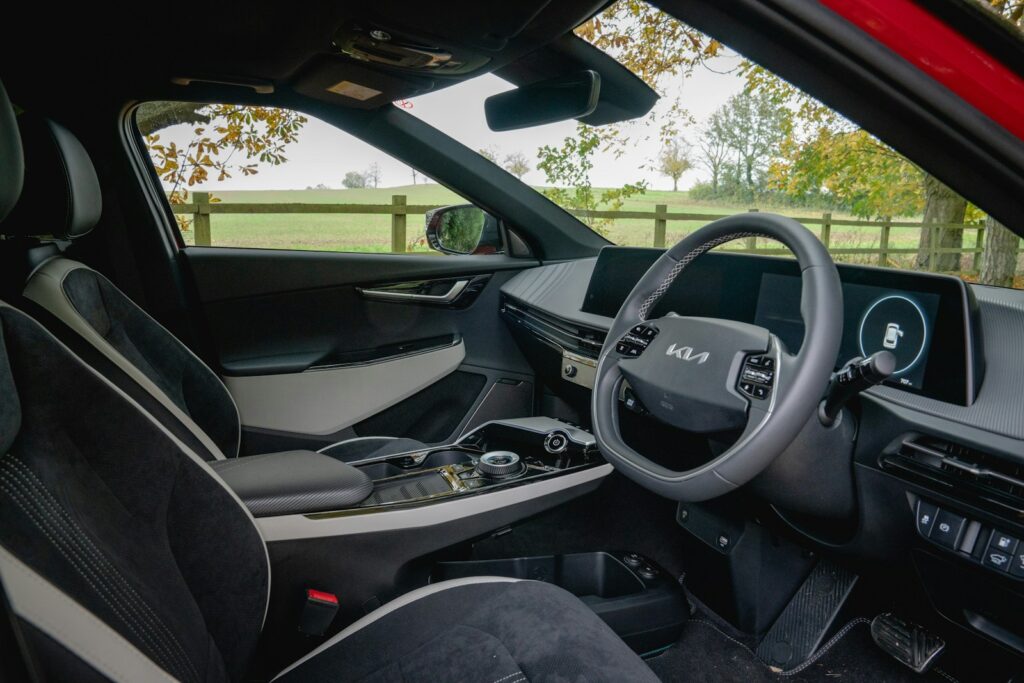 Interior view of a modern car dashboard and seats.