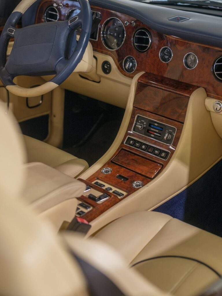 Luxurious car interior with wood accents.
