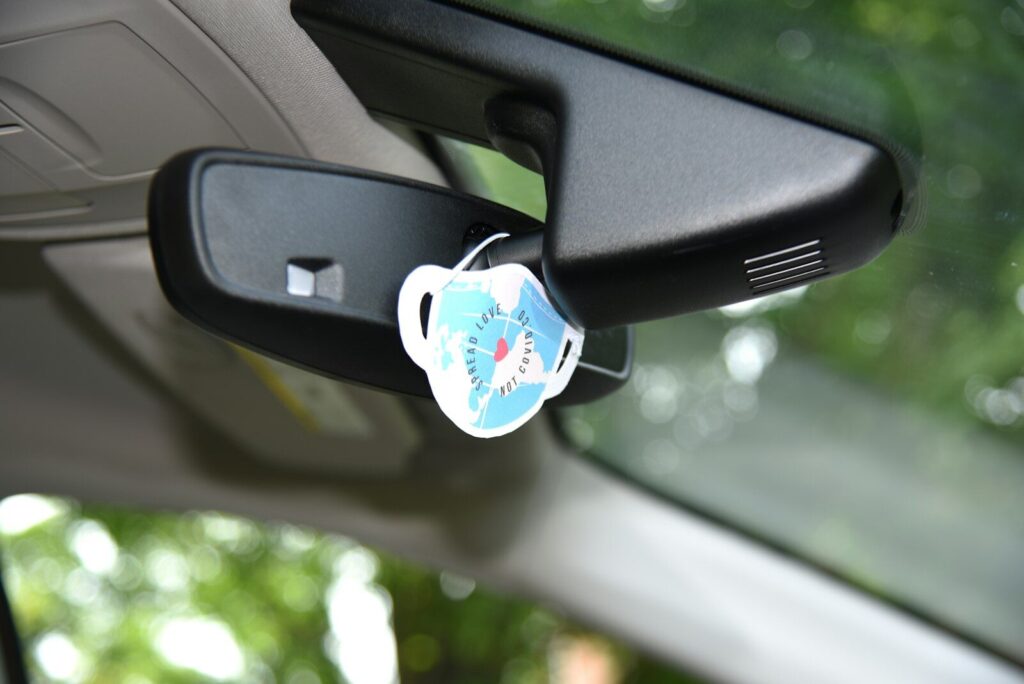 white and blue car air freshener