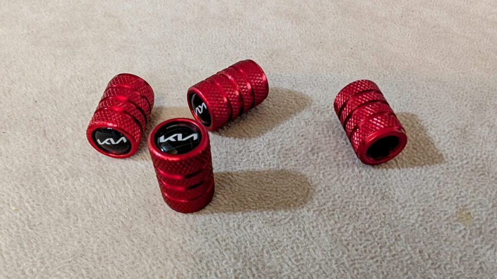 A group of red grips sitting on top of a carpet
